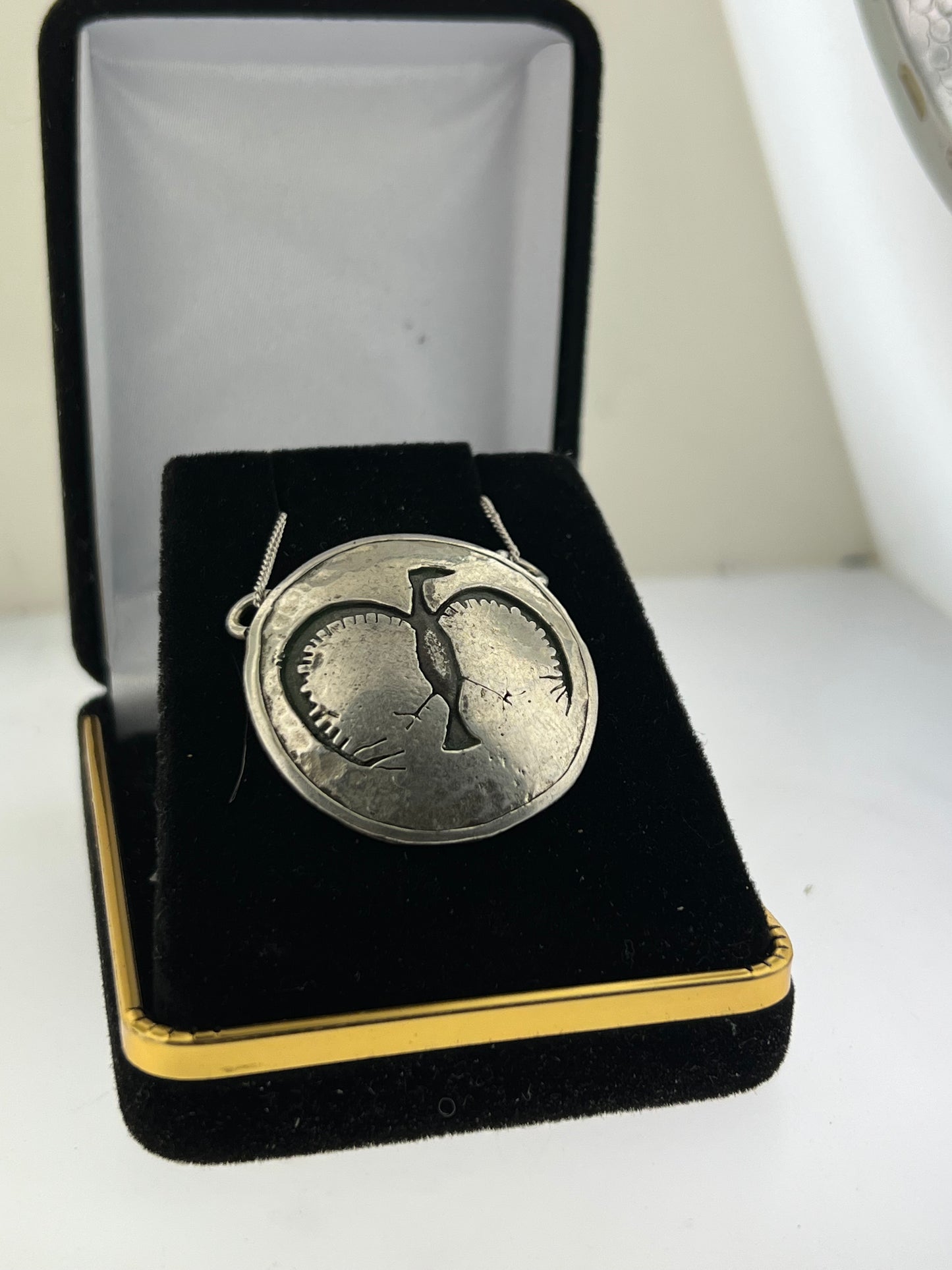 Custom smooth Sterling silver pictograph pendant from the Nicola valley