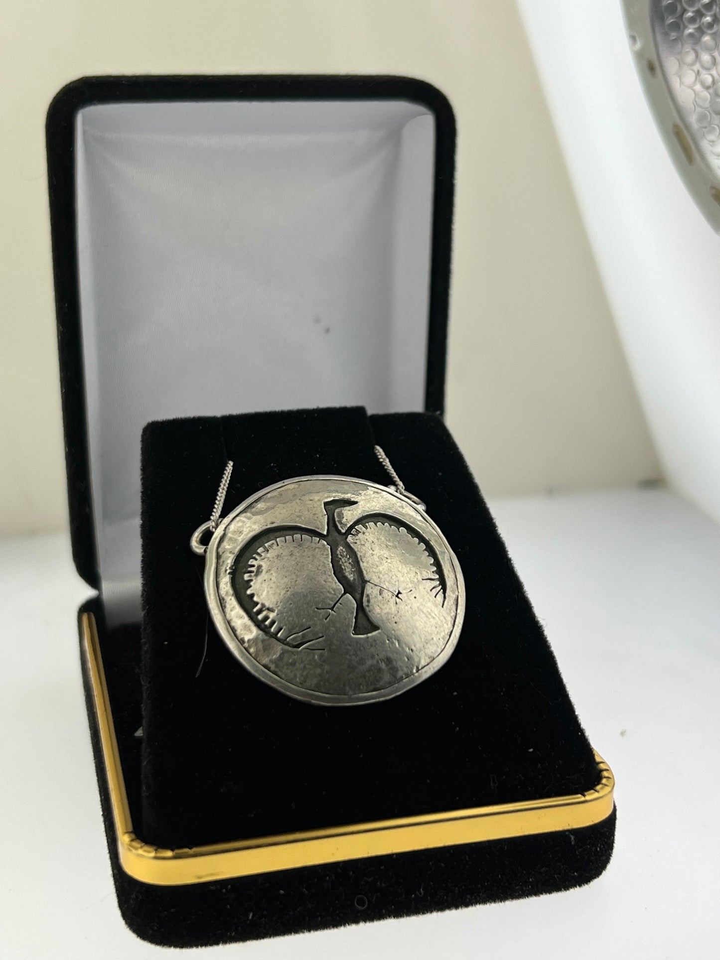 Custom smooth Sterling silver pictograph pendant from the Nicola valley