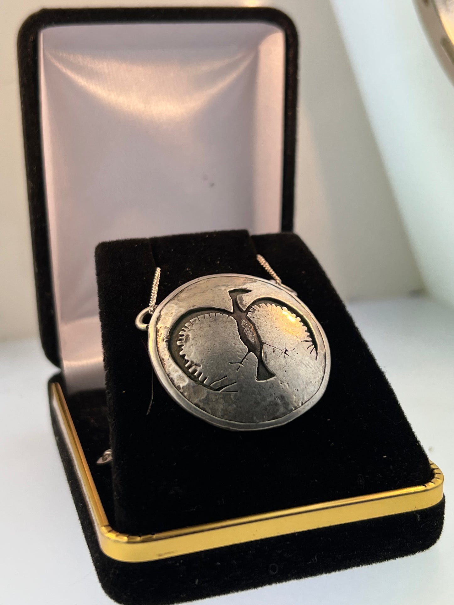 Custom smooth Sterling silver pictograph pendant from the Nicola valley
