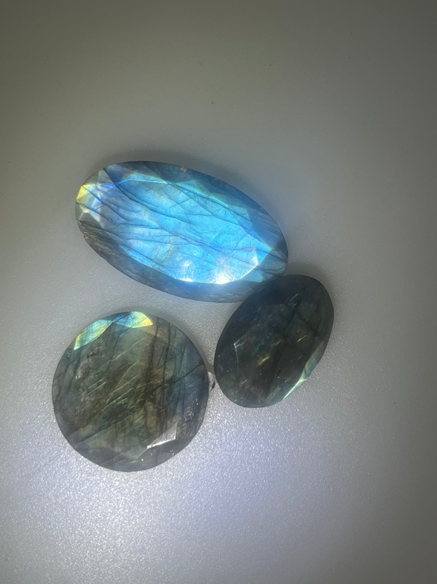 Labradorite cabochons facetted