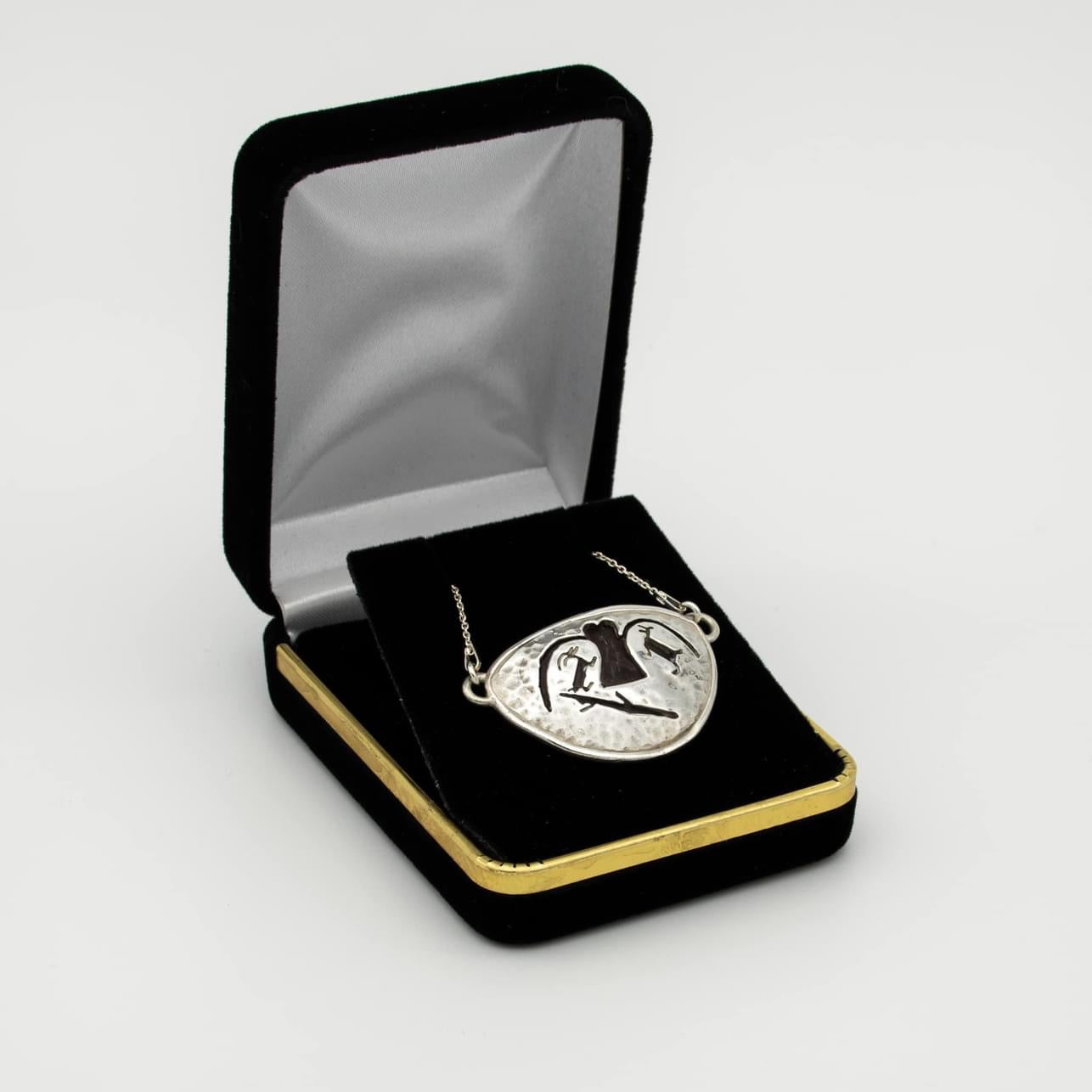 Protector pictograph pendant