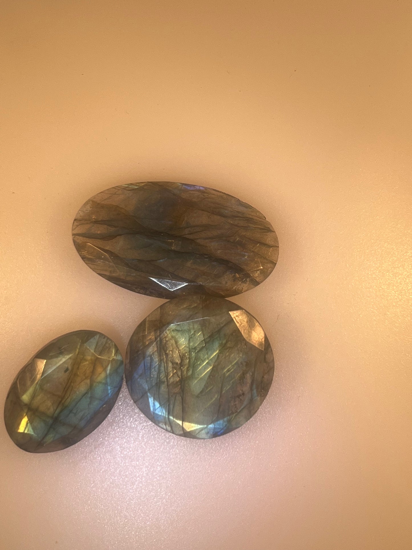 Labradorite cabochons facetted