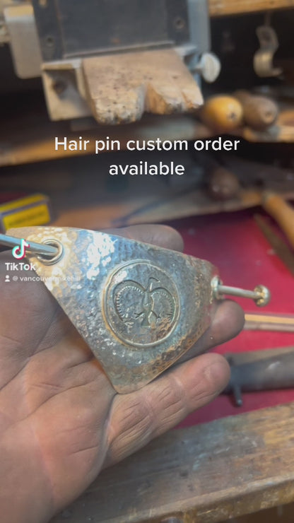 Eagle hair barrette pictograph