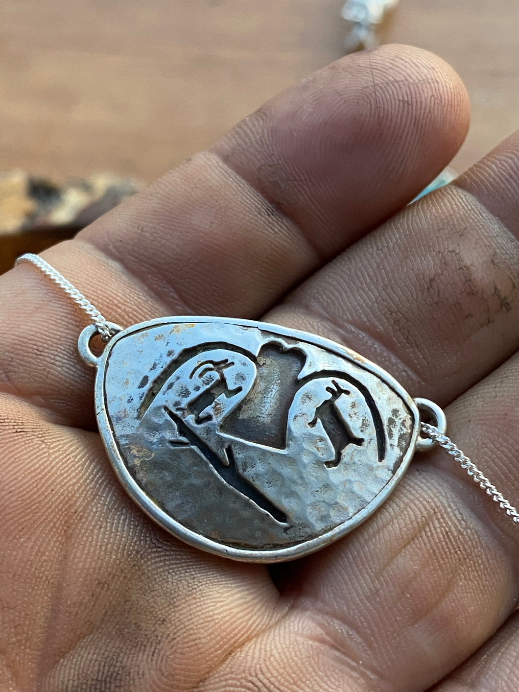 Protector pictograph pendant