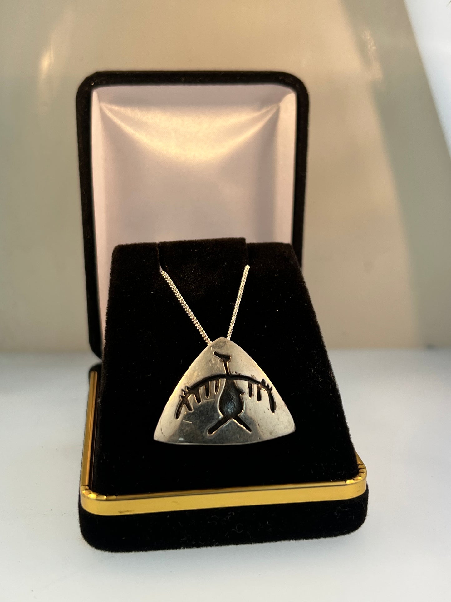 Sterling silver pictograph pendant from the Nicola valley