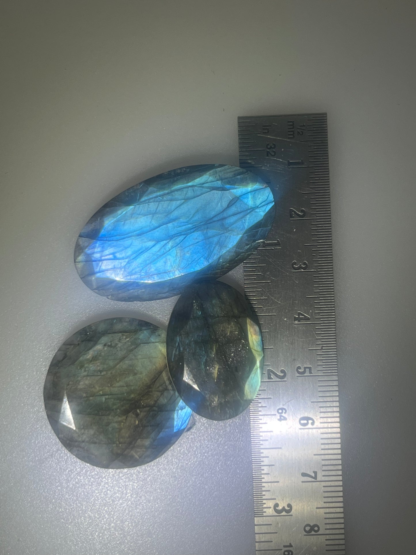 Labradorite cabochons facetted