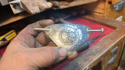 Eagle hair barrette pictograph