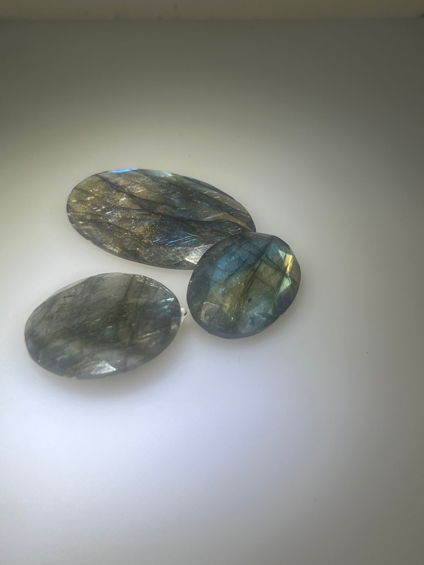 Labradorite cabochons facetted